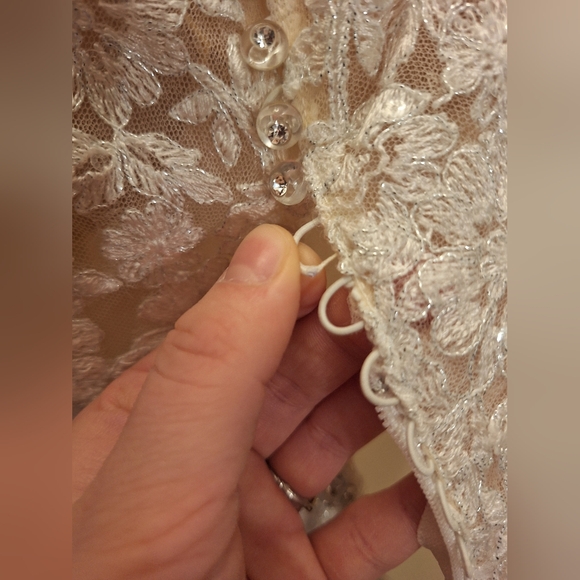 Elegant Lace Off-Shoulder Wedding Dress - Picture 6 of 10